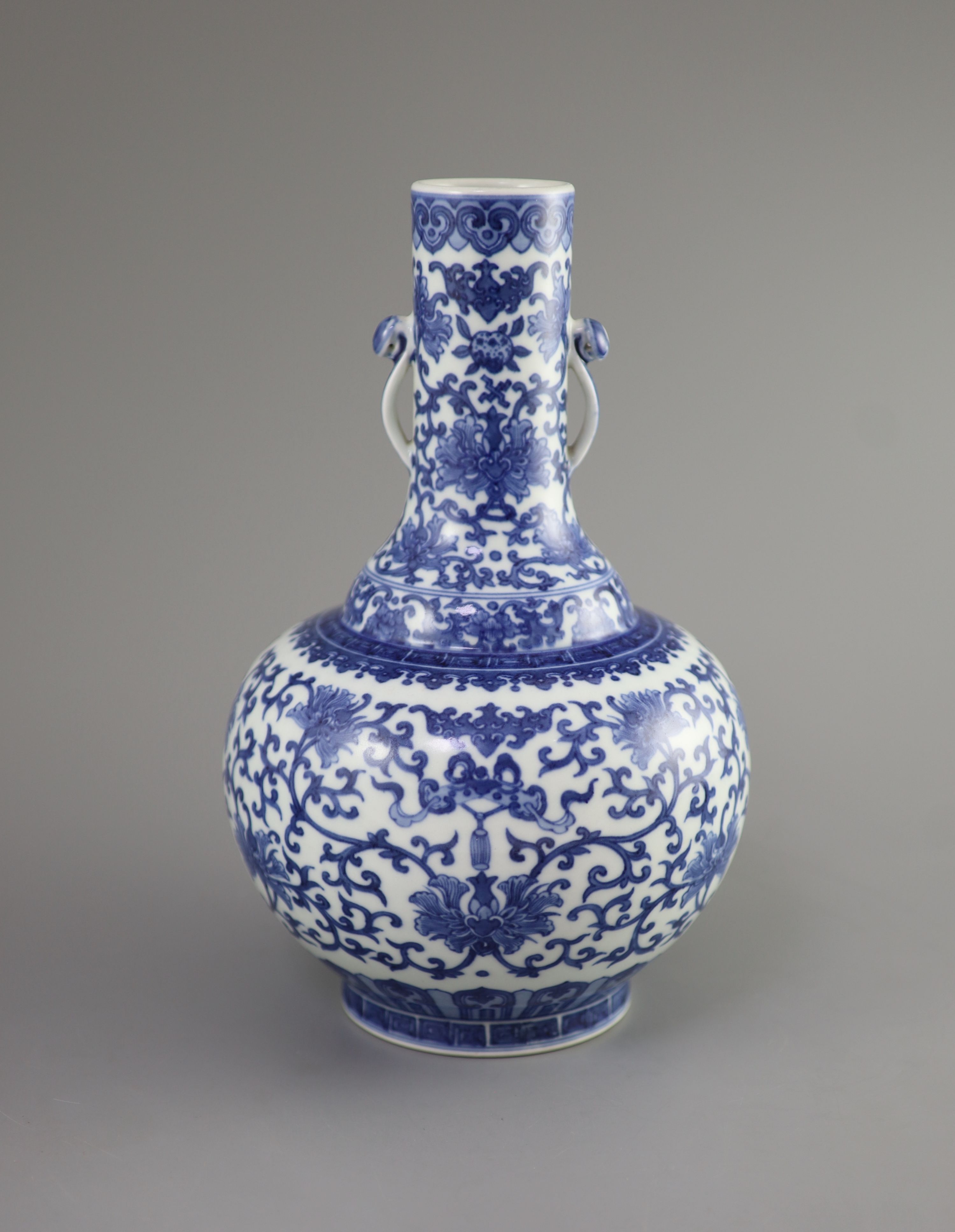 A Chinese blue and white bottle vase, Daoguang seal mark and possibly of the period, 28.5cm high